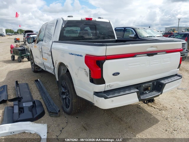 2023 Ford F-150 Lightning Lariat მანქანა იყიდება აუქციონზე, vin: 1FT6W1EV0PWG08515, აუქციონის ნომერი: 12675262