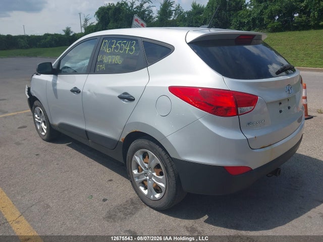KM8JT3AF1EU907786 Hyundai Tucson Gl