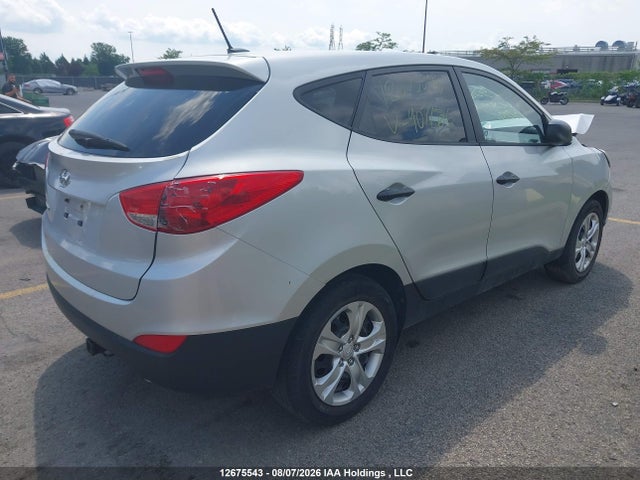 KM8JT3AF1EU907786 Hyundai Tucson Gl