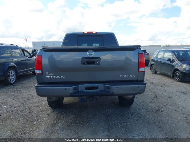 12675698 :رقم المزاد ، 1N6AA0EC0FN508109 vin ، 2015 Nissan Titan مزاد بيع
