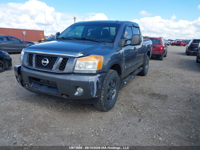 12675698 :رقم المزاد ، 1N6AA0EC0FN508109 vin ، 2015 Nissan Titan مزاد بيع