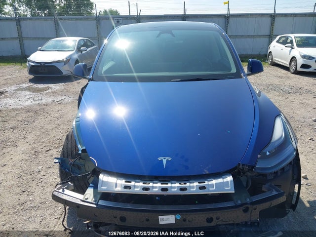 Auction sale of the 2024 Tesla Model Y Long Range, vin: LRWYGDEE3RC670550, lot number: 12676083