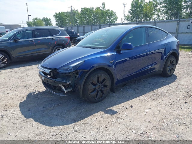 Auction sale of the 2024 Tesla Model Y Long Range, vin: LRWYGDEE3RC670550, lot number: 12676083