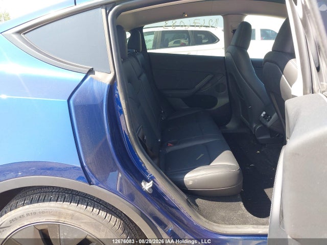 Auction sale of the 2024 Tesla Model Y Long Range, vin: LRWYGDEE3RC670550, lot number: 12676083