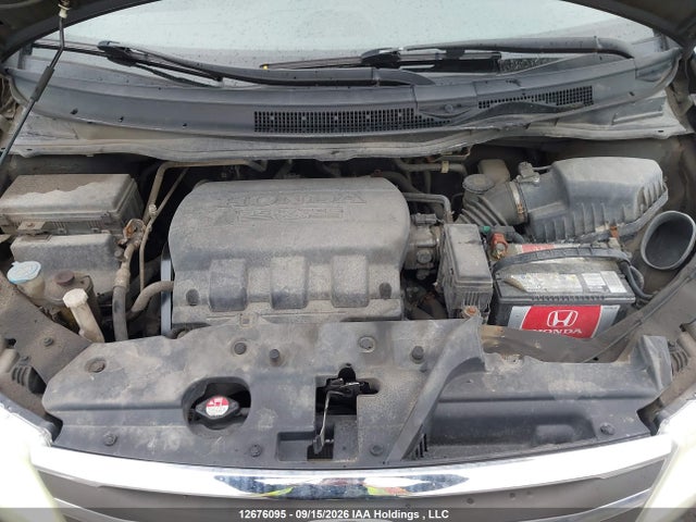 12676095 :رقم المزاد ، 5FNRL5H24BB505920 vin ، 2011 Honda Odyssey مزاد بيع