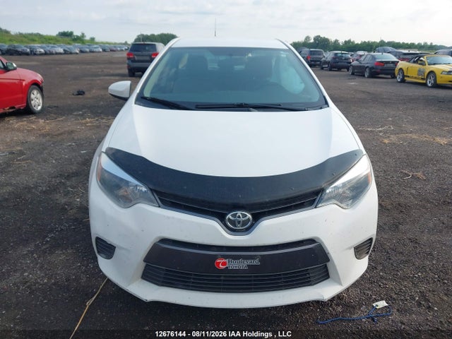 2T1BURHE6GC585801 Toyota COROLLA LE