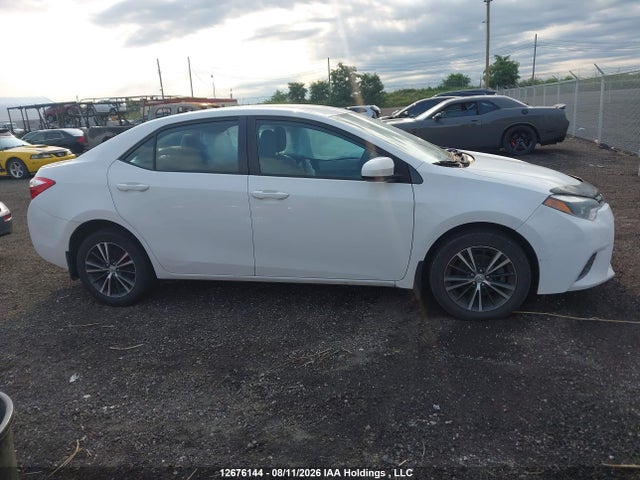 2T1BURHE6GC585801 Toyota COROLLA LE