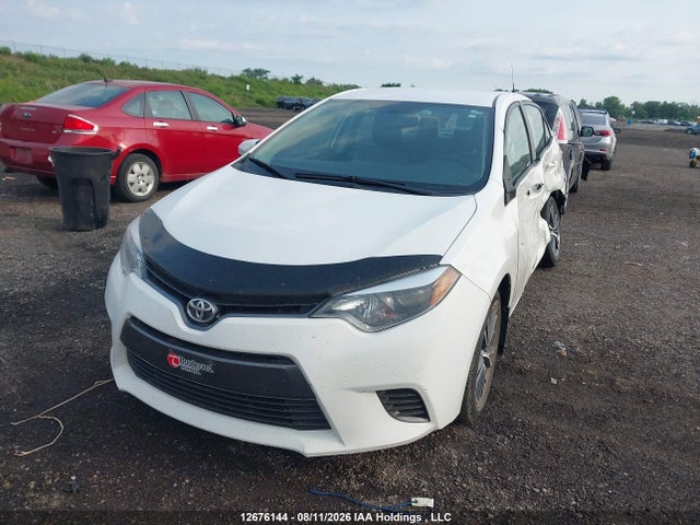 2T1BURHE6GC585801 Toyota COROLLA LE