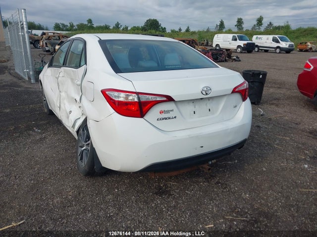 2T1BURHE6GC585801 Toyota COROLLA LE
