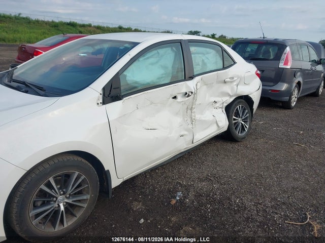 2T1BURHE6GC585801 Toyota COROLLA LE