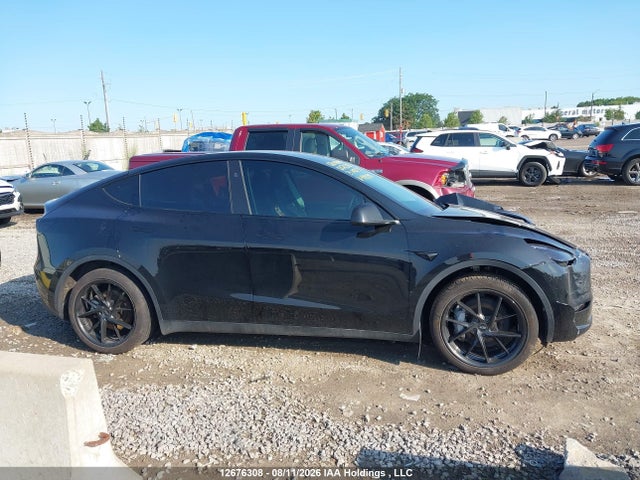 Auction sale of the 2024 Tesla Model Y Long Range, vin: 7SAYGDEE3RF989293, lot number: 12676308