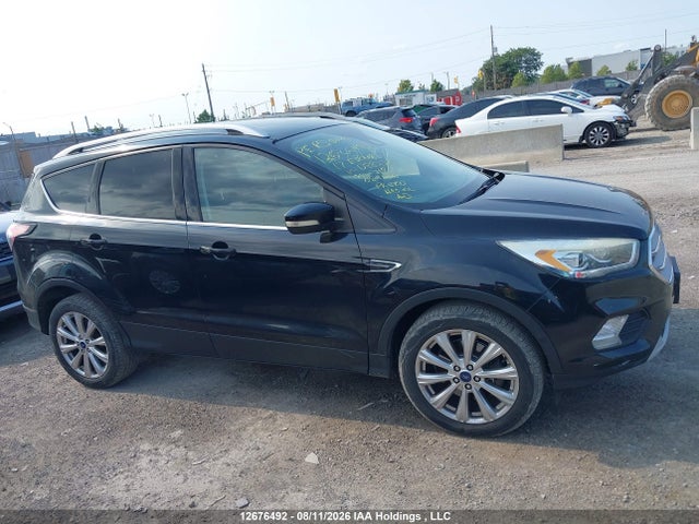 12676492 :رقم المزاد ، 1FMCU9J98HUD88226 vin ، 2017 Ford Escape Titanium مزاد بيع