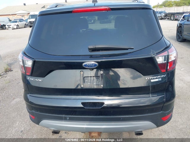 12676492 :رقم المزاد ، 1FMCU9J98HUD88226 vin ، 2017 Ford Escape Titanium مزاد بيع