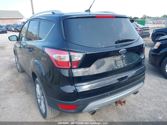 12676492 :رقم المزاد ، 1FMCU9J98HUD88226 vin ، 2017 Ford Escape Titanium مزاد بيع