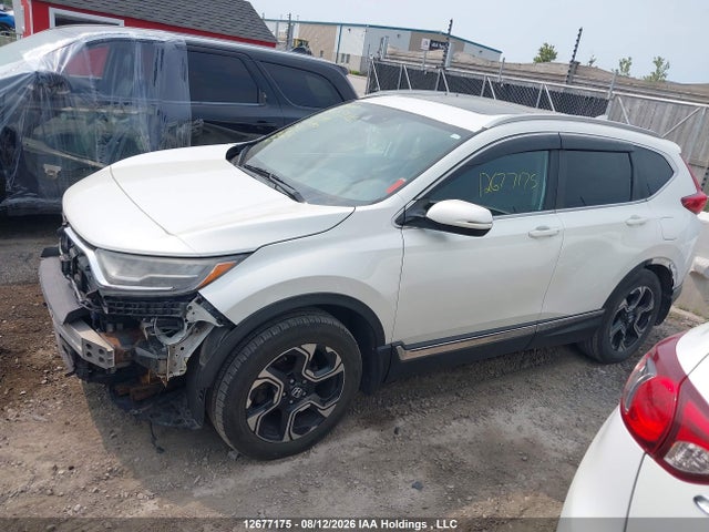 2017 Honda Cr-v Touring მანქანა იყიდება აუქციონზე, vin: 2HKRW2H94HH111847, აუქციონის ნომერი: 12677175