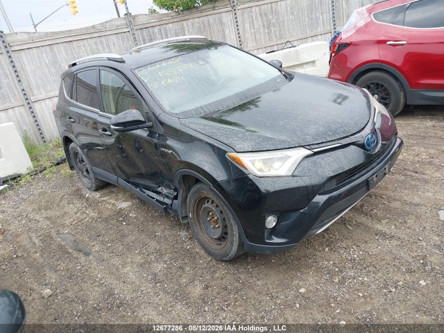 Toyota Rav4 Hybrid Le+ 2018 JTMRJREV6JD188787 головне зображення