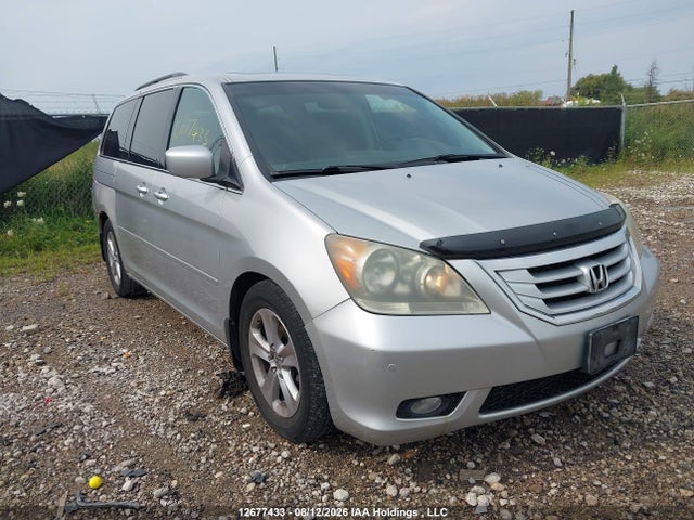 2010 Honda Odyssey Touring მანქანა იყიდება აუქციონზე, vin: 5FNRL3H83AB504216, აუქციონის ნომერი: 12677433