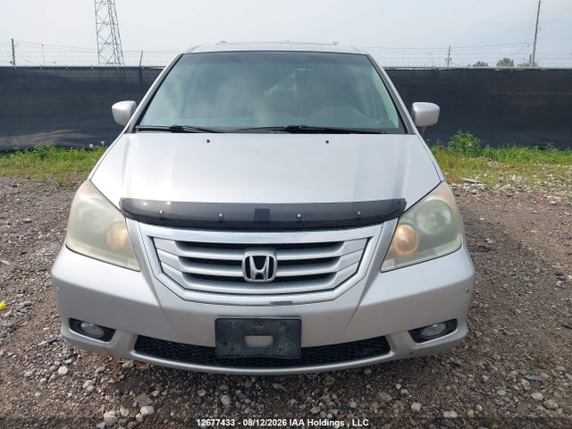 2010 Honda Odyssey Touring მანქანა იყიდება აუქციონზე, vin: 5FNRL3H83AB504216, აუქციონის ნომერი: 12677433