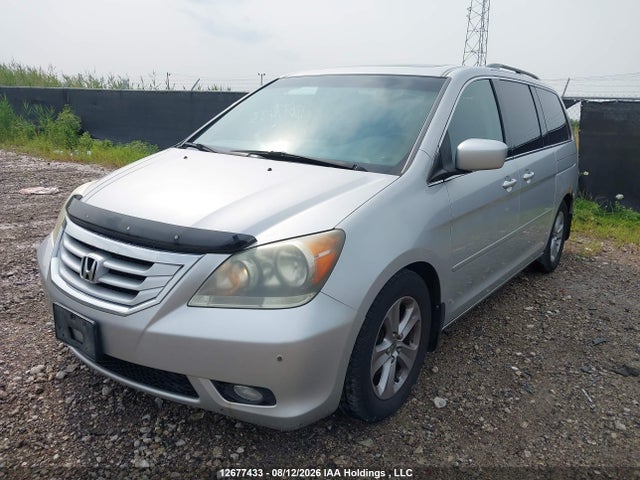 2010 Honda Odyssey Touring მანქანა იყიდება აუქციონზე, vin: 5FNRL3H83AB504216, აუქციონის ნომერი: 12677433