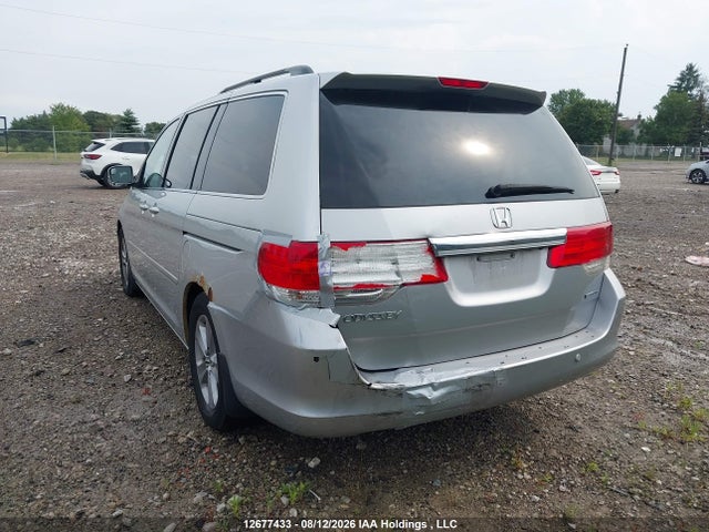 2010 Honda Odyssey Touring მანქანა იყიდება აუქციონზე, vin: 5FNRL3H83AB504216, აუქციონის ნომერი: 12677433