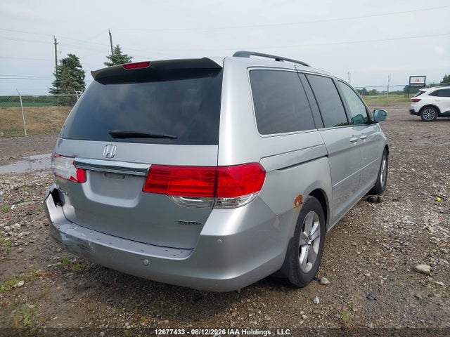 2010 Honda Odyssey Touring მანქანა იყიდება აუქციონზე, vin: 5FNRL3H83AB504216, აუქციონის ნომერი: 12677433