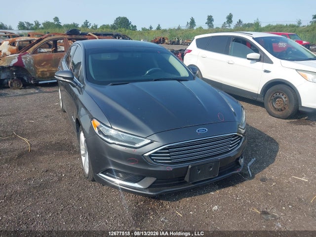 12677518 :رقم المزاد ، 3FA6P0LU4JR147921 vin ، 2018 Ford Fusion Hybrid Hybrid مزاد بيع
