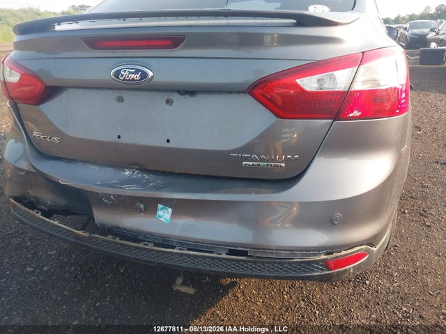 Продажа на аукционе авто 2013 Ford Focus Titanium, vin: 1FADP3J26DL147013, номер лота: 12677811