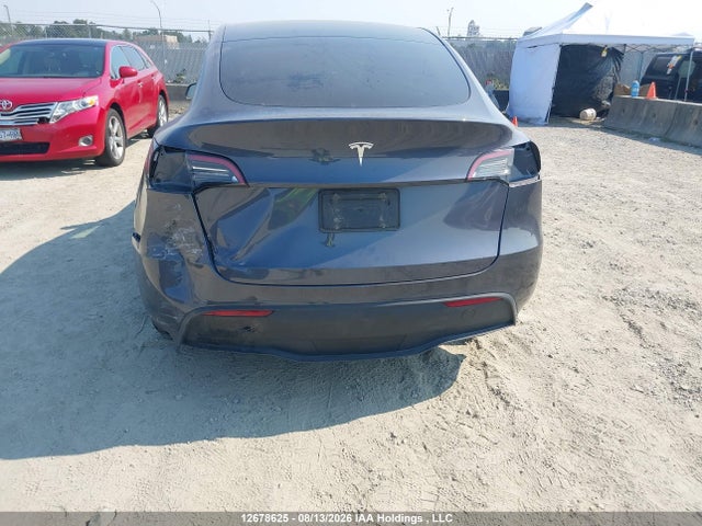 Tesla Model Y 2023 LRWYGDFD2PC227549 Image 6