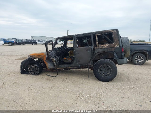 Продажа на аукционе авто 2009 Jeep Wrangler Unlimited Sahara, vin: 1J8GA59109L744951, номер лота: 12680009