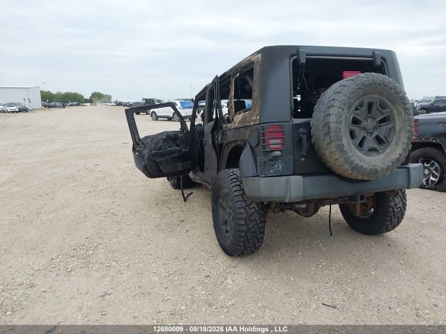 Продажа на аукционе авто 2009 Jeep Wrangler Unlimited Sahara, vin: 1J8GA59109L744951, номер лота: 12680009