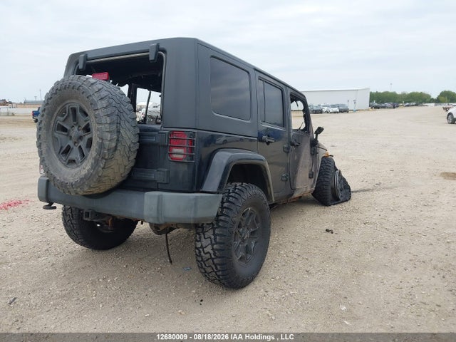 Продажа на аукционе авто 2009 Jeep Wrangler Unlimited Sahara, vin: 1J8GA59109L744951, номер лота: 12680009