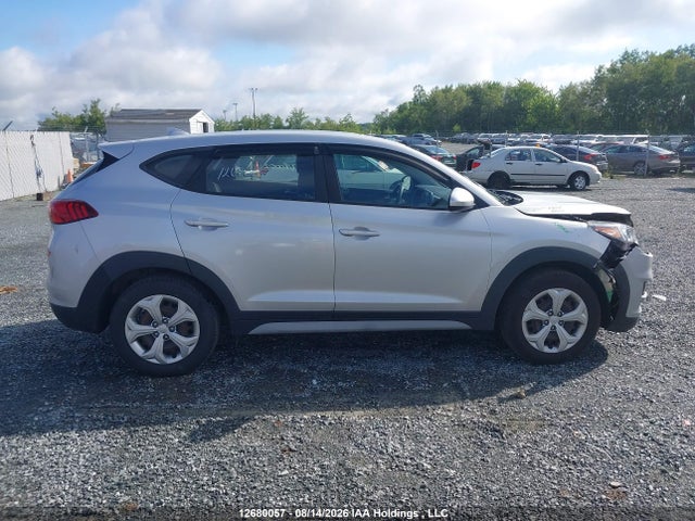 2019 Hyundai Tucson Essential W/safety Package მანქანა იყიდება აუქციონზე, vin: KM8J2CA46KU910566, აუქციონის ნომერი: 12680057