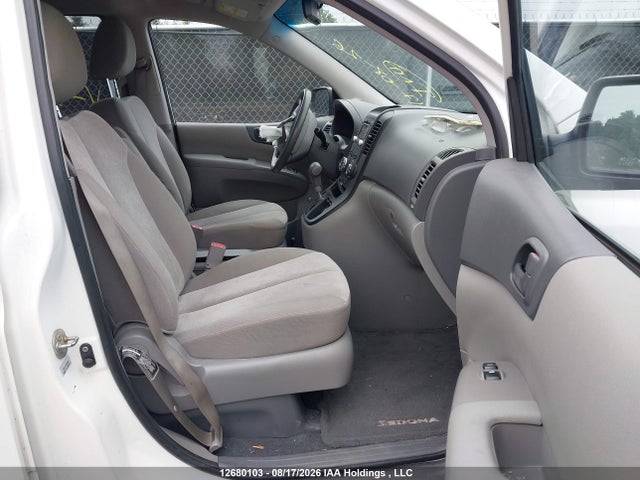 KNDMG4C79E6560889 KIA Sedona Lx/lx Convenience