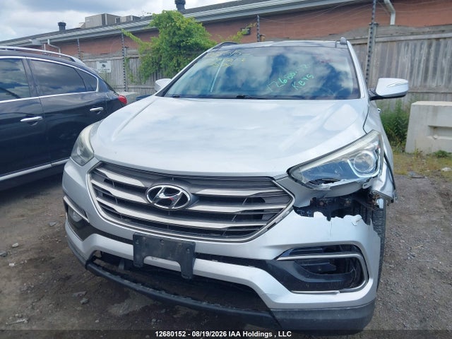 12680152 :رقم المزاد ، 5XYZUDLB1HG412594 vin ، 2017 Hyundai Santa Fe Sport مزاد بيع