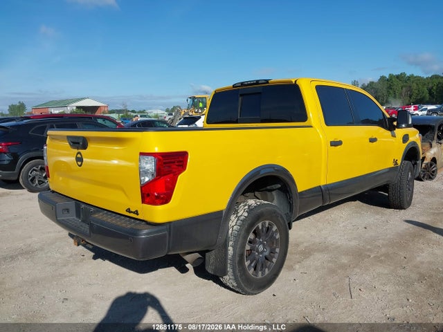12681175 :رقم المزاد ، 1N6BA1F43GN501643 vin ، 2016 Nissan Titan Xd Sl/pro-4x/plat Reserve مزاد بيع