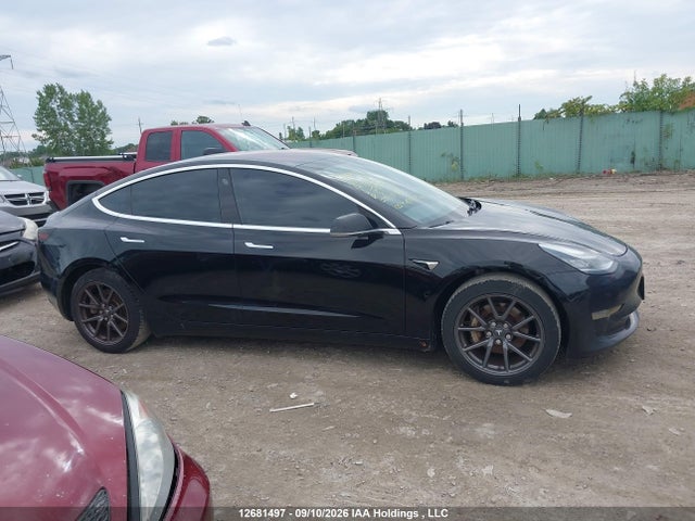 Продажа на аукционе авто 2018 Tesla Model 3, vin: 5YJ3E1EAXJF028574, номер лота: 12681497