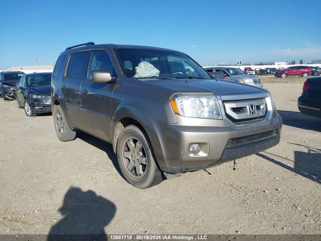 Продажа на аукционе авто 2011 Honda Pilot Touring, vin: 5FNYF4H91BB503519, номер лота: 12681718