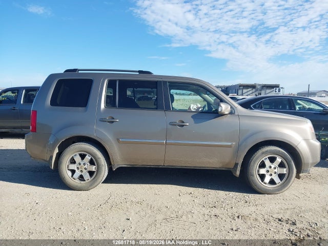 12681718 :رقم المزاد ، 5FNYF4H91BB503519 vin ، 2011 Honda Pilot Touring مزاد بيع