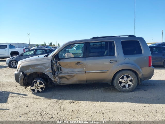 12681718 :رقم المزاد ، 5FNYF4H91BB503519 vin ، 2011 Honda Pilot Touring مزاد بيع