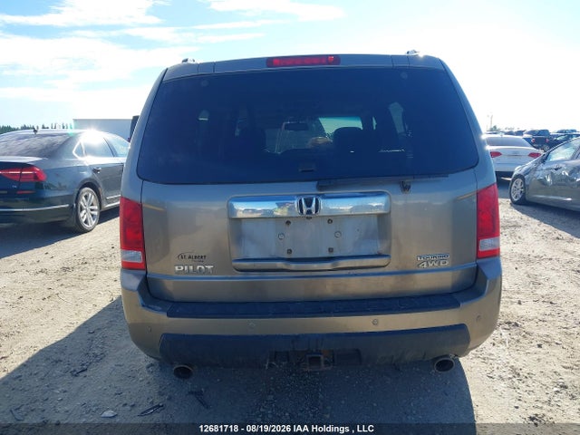 12681718 :رقم المزاد ، 5FNYF4H91BB503519 vin ، 2011 Honda Pilot Touring مزاد بيع