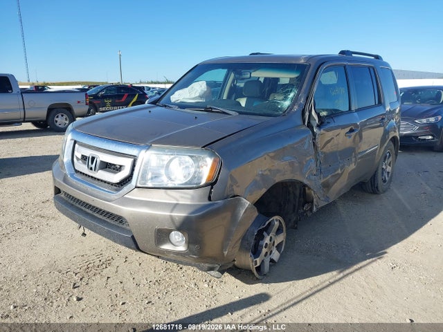 12681718 :رقم المزاد ، 5FNYF4H91BB503519 vin ، 2011 Honda Pilot Touring مزاد بيع