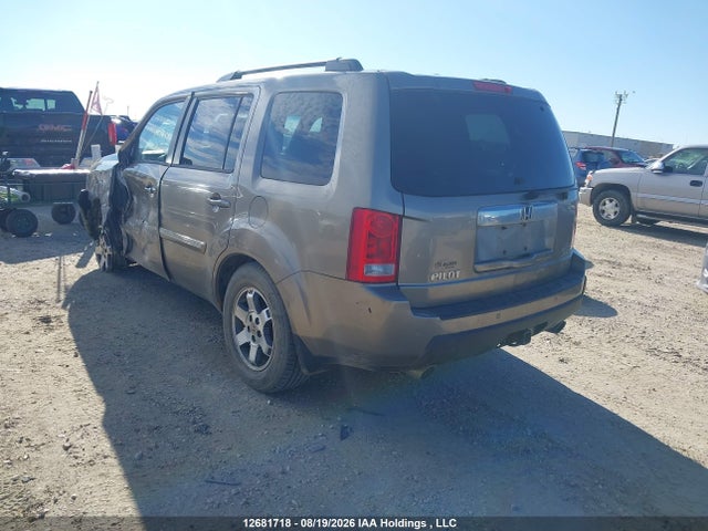 12681718 :رقم المزاد ، 5FNYF4H91BB503519 vin ، 2011 Honda Pilot Touring مزاد بيع