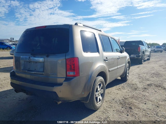 12681718 :رقم المزاد ، 5FNYF4H91BB503519 vin ، 2011 Honda Pilot Touring مزاد بيع