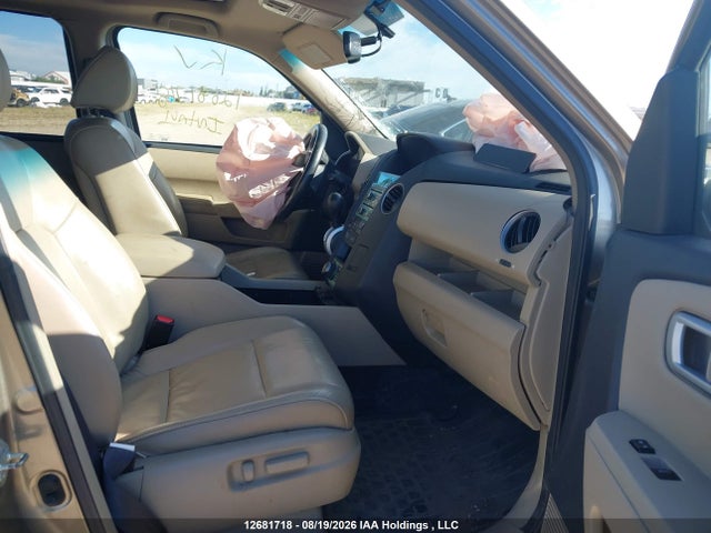 12681718 :رقم المزاد ، 5FNYF4H91BB503519 vin ، 2011 Honda Pilot Touring مزاد بيع