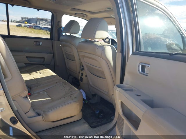 12681718 :رقم المزاد ، 5FNYF4H91BB503519 vin ، 2011 Honda Pilot Touring مزاد بيع