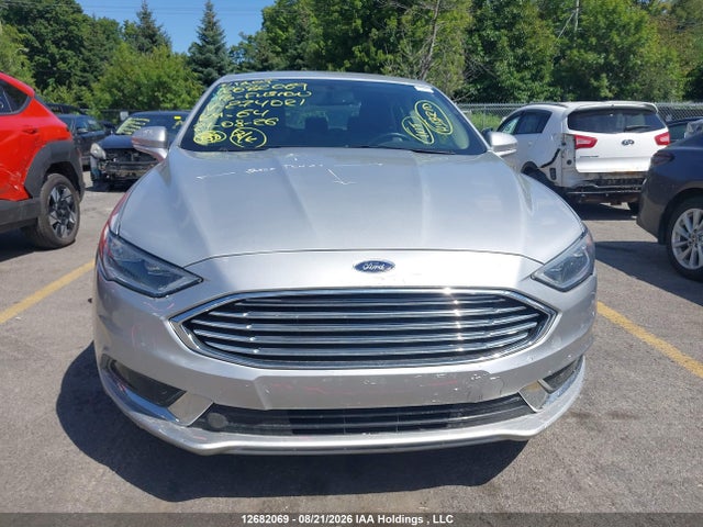 12682069 :رقم المزاد ، 3FA6P0PU8JR274021 vin ، 2018 Ford Fusion مزاد بيع