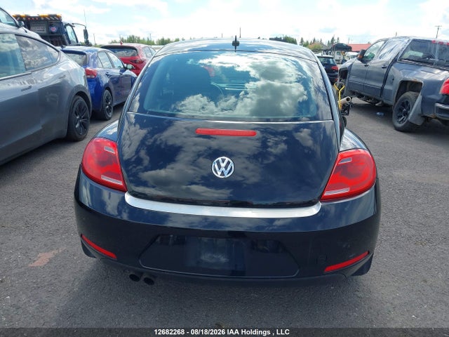 12682268 :رقم المزاد ، 3VWH07AT8EM663757 vin ، 2014 Volkswagen Beetle Turbo مزاد بيع
