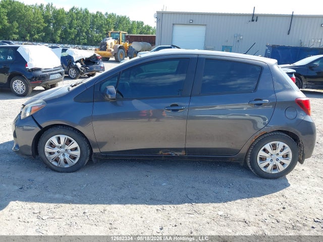 VNKKTUD30FA051164 Toyota YARIS LE
