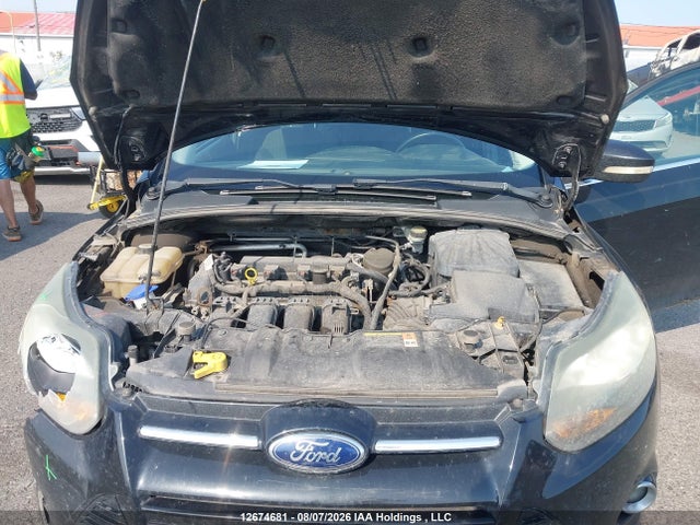 12674681 :رقم المزاد ، 1FADP3J24DL293202 vin ، 2013 Ford Focus Titanium مزاد بيع