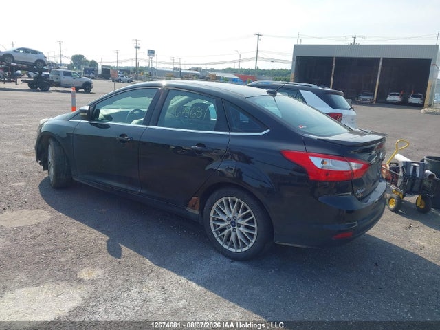 12674681 :رقم المزاد ، 1FADP3J24DL293202 vin ، 2013 Ford Focus Titanium مزاد بيع